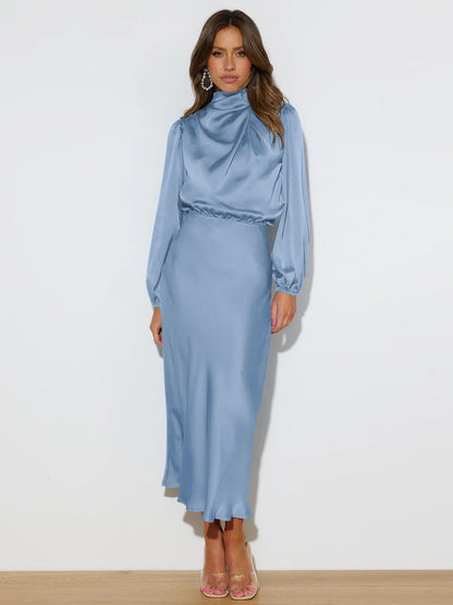 This high-end satin long-sleeved loose dress is an elegant and refined evening dress for women