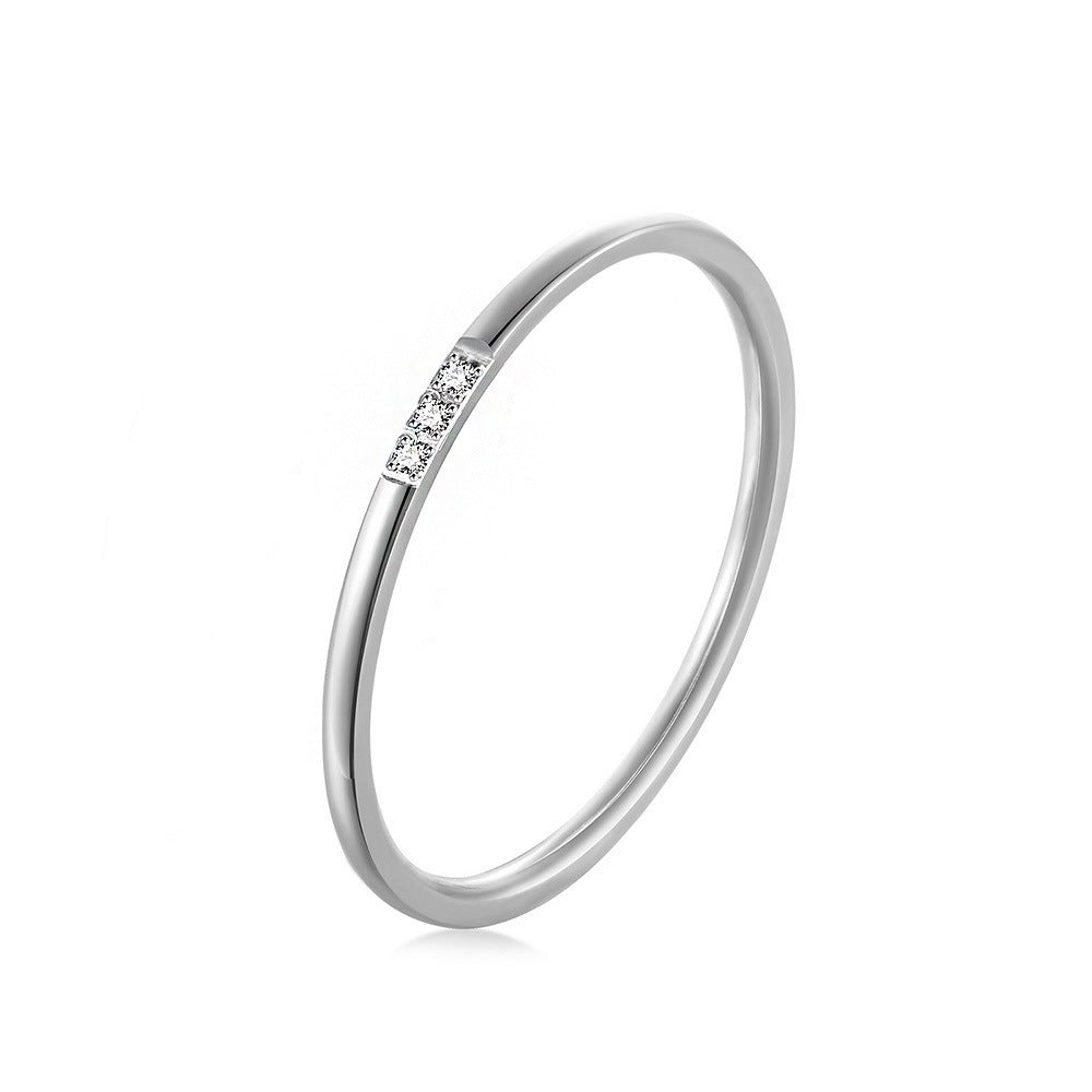Three-diamond titanium steel ring