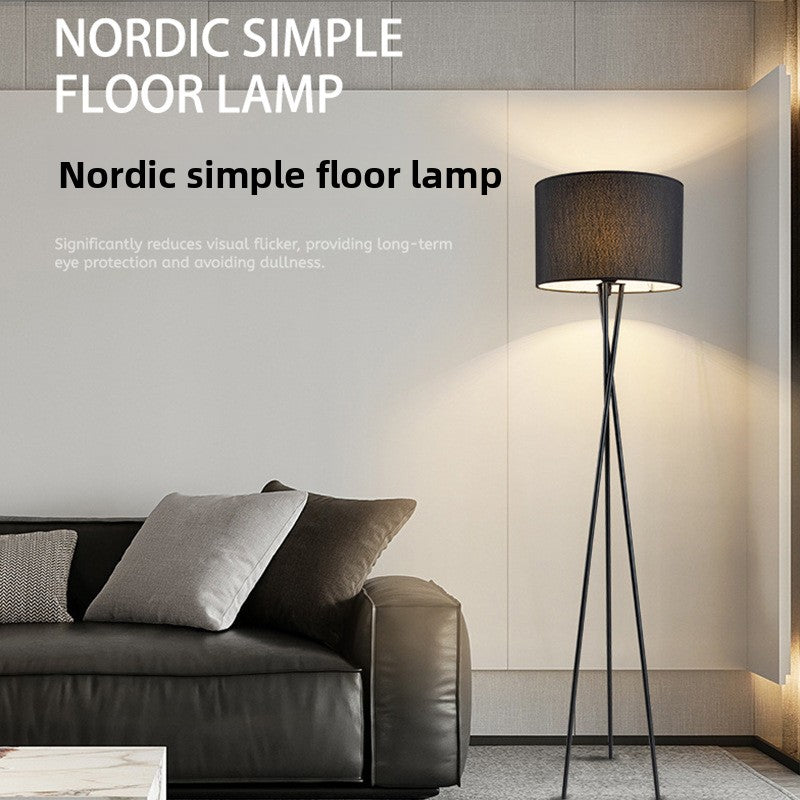 Three-legged floor lamp
