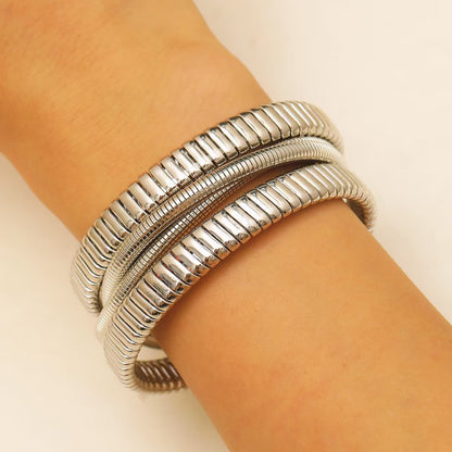 Three-wire wound spring collar bracelet