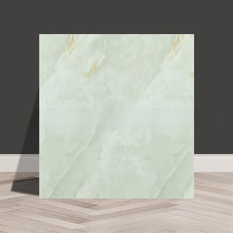 Tile stickers are pasted on the imitation marble wall