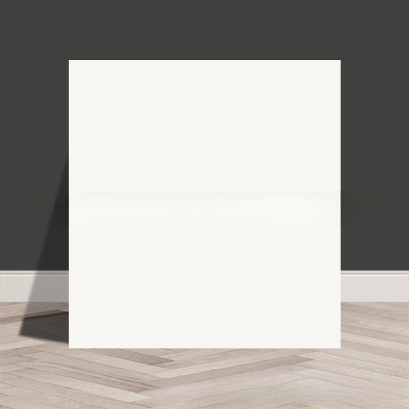 Tile stickers are pasted on the imitation marble wall