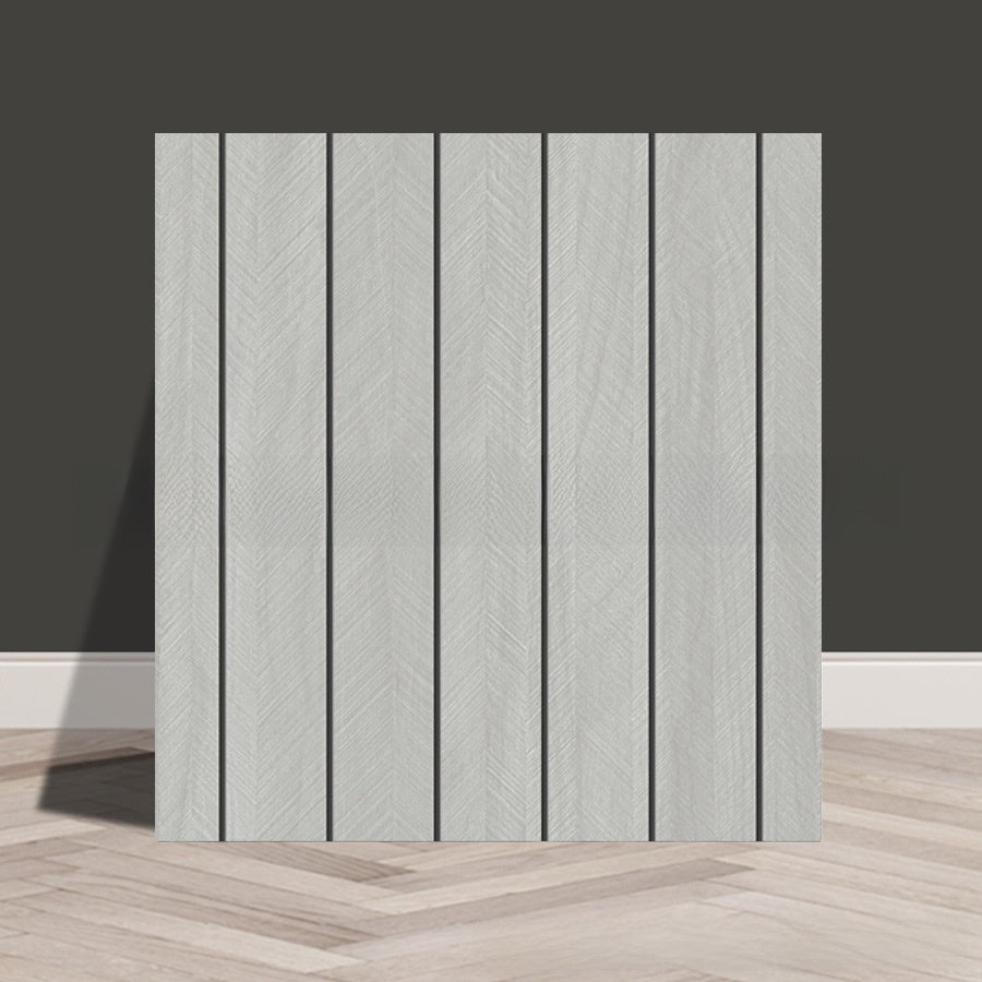 Tile stickers are pasted on the imitation marble wall