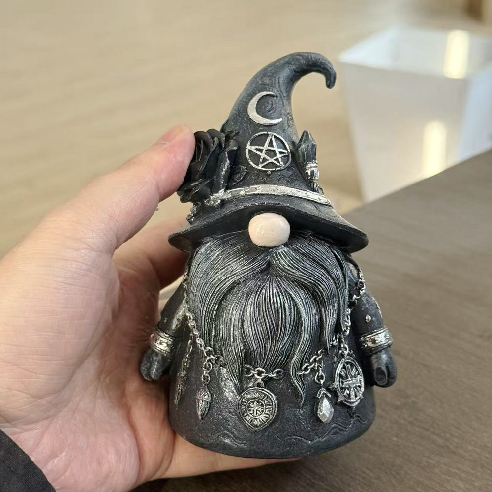 Tiny resin figurine of a dwarf