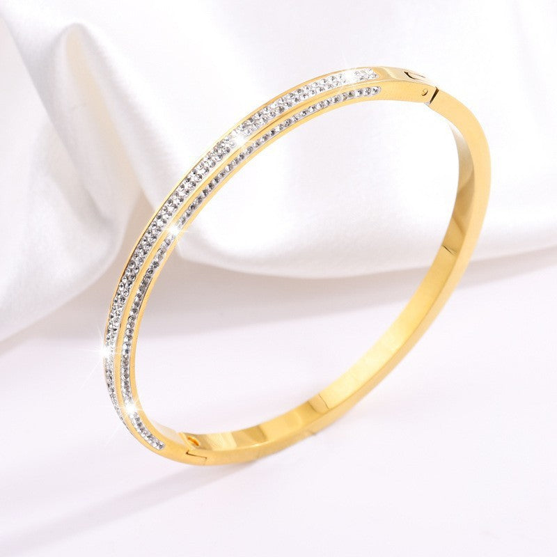 Titanium and steel bracelet set with diamonds