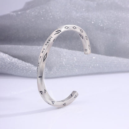 Titanium and steel bracelet set with diamonds