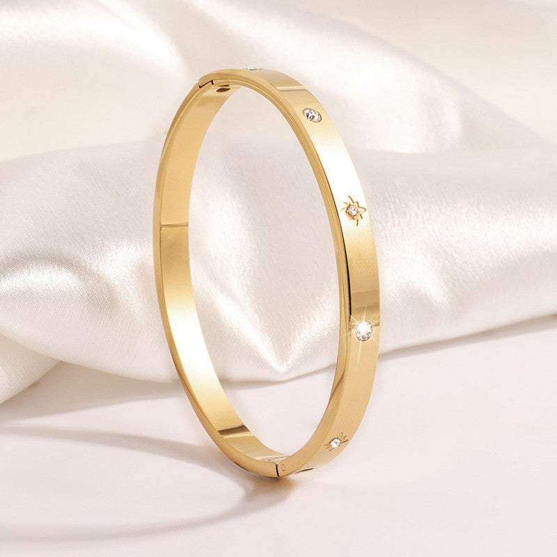 Titanium and steel bracelet set with diamonds