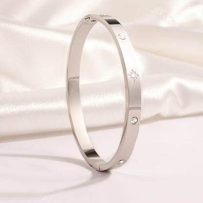 Titanium and steel bracelet set with diamonds