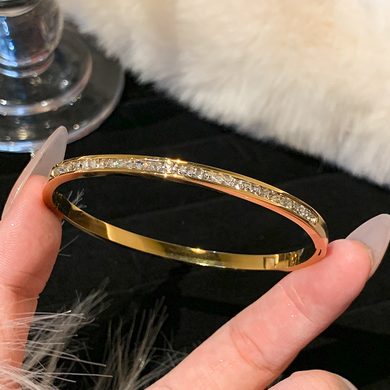 Titanium and steel bracelet set with diamonds