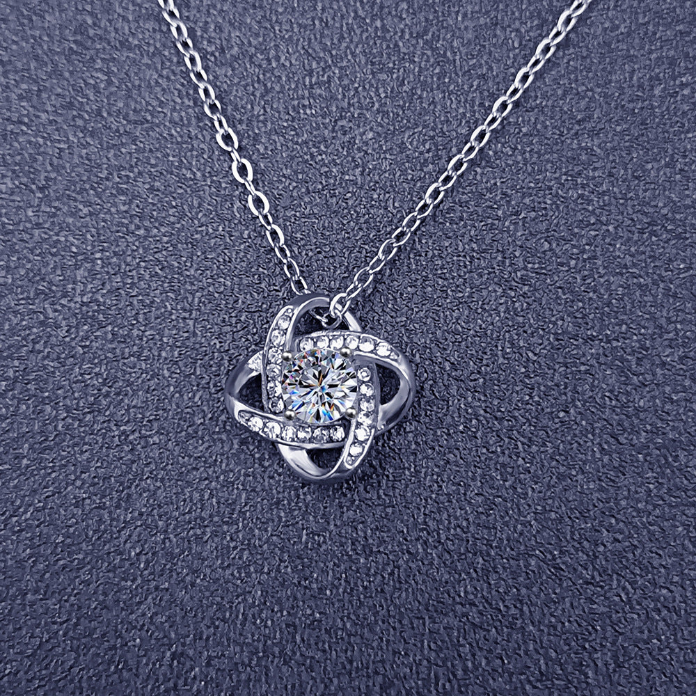 Titanium Steel Clover Necklace with Rotating Zircon Pendant