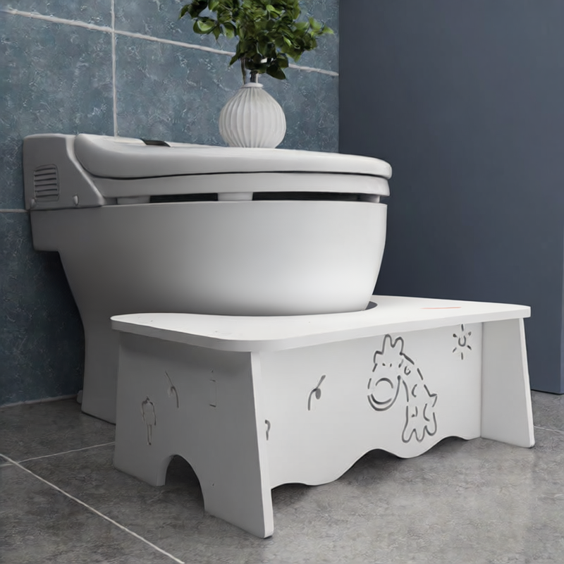 Toilet seat footrest