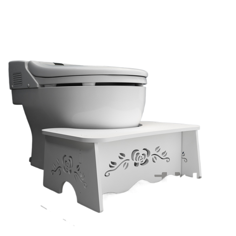 Toilet seat footrest