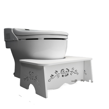 Toilet seat footrest