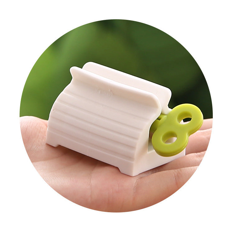 Toothpaste squeezer