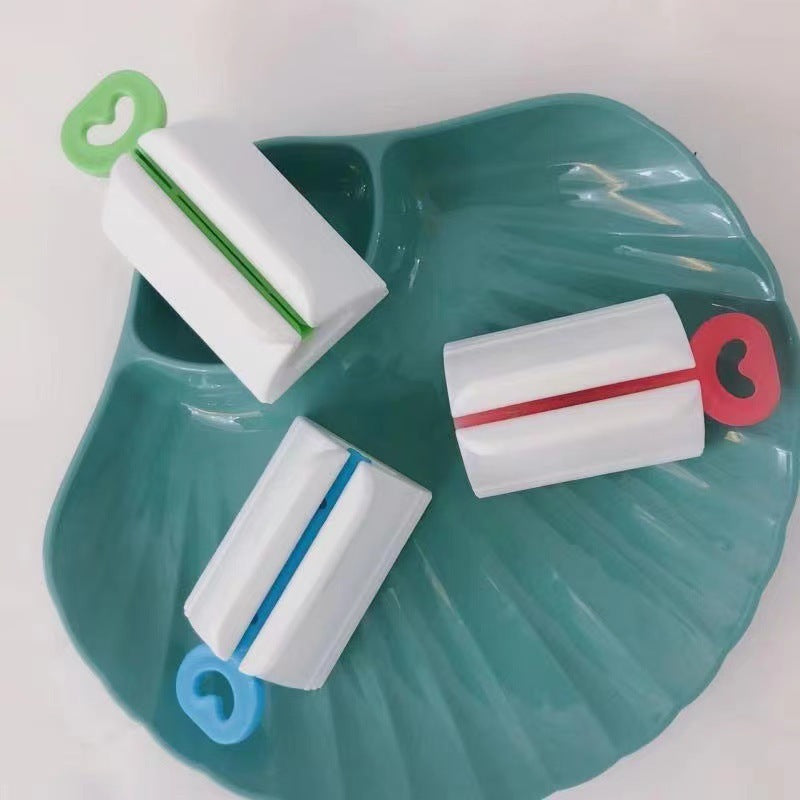 Toothpaste squeezer
