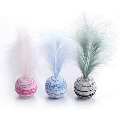Toy balls with feathers