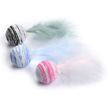 Toy balls with feathers