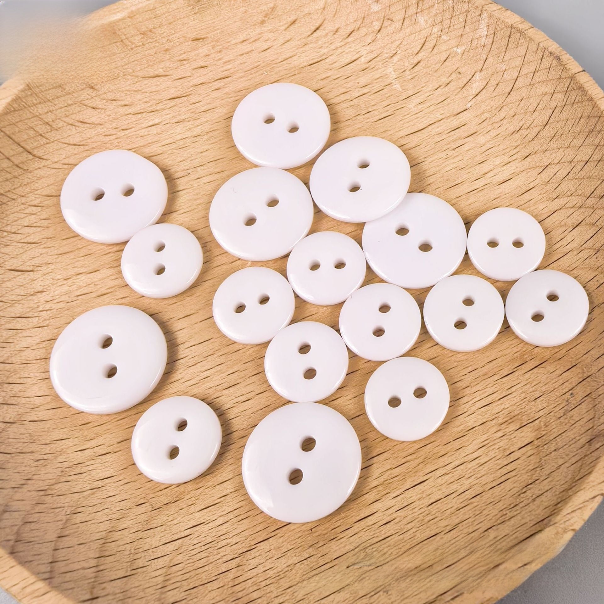 Transparent resin button