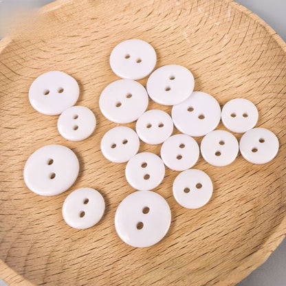 Transparent resin button