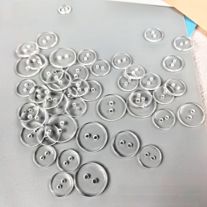 Transparent resin button