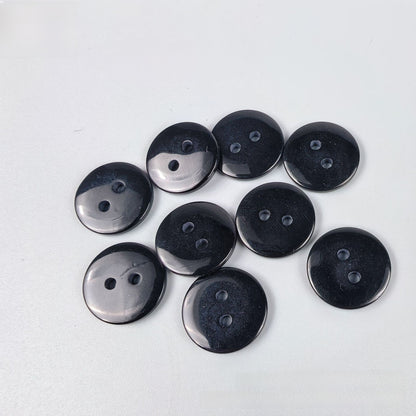 Transparent resin button