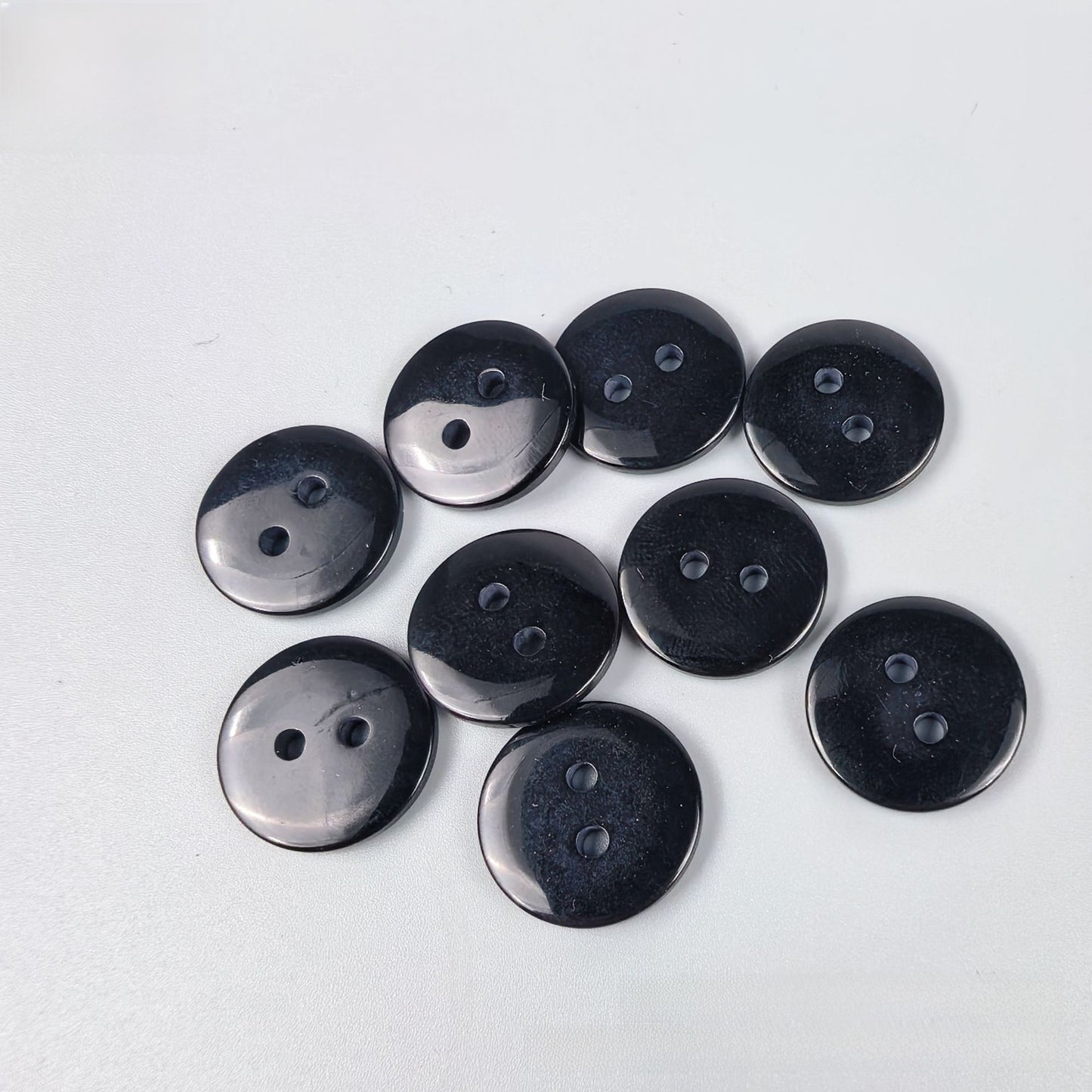 Transparent resin button