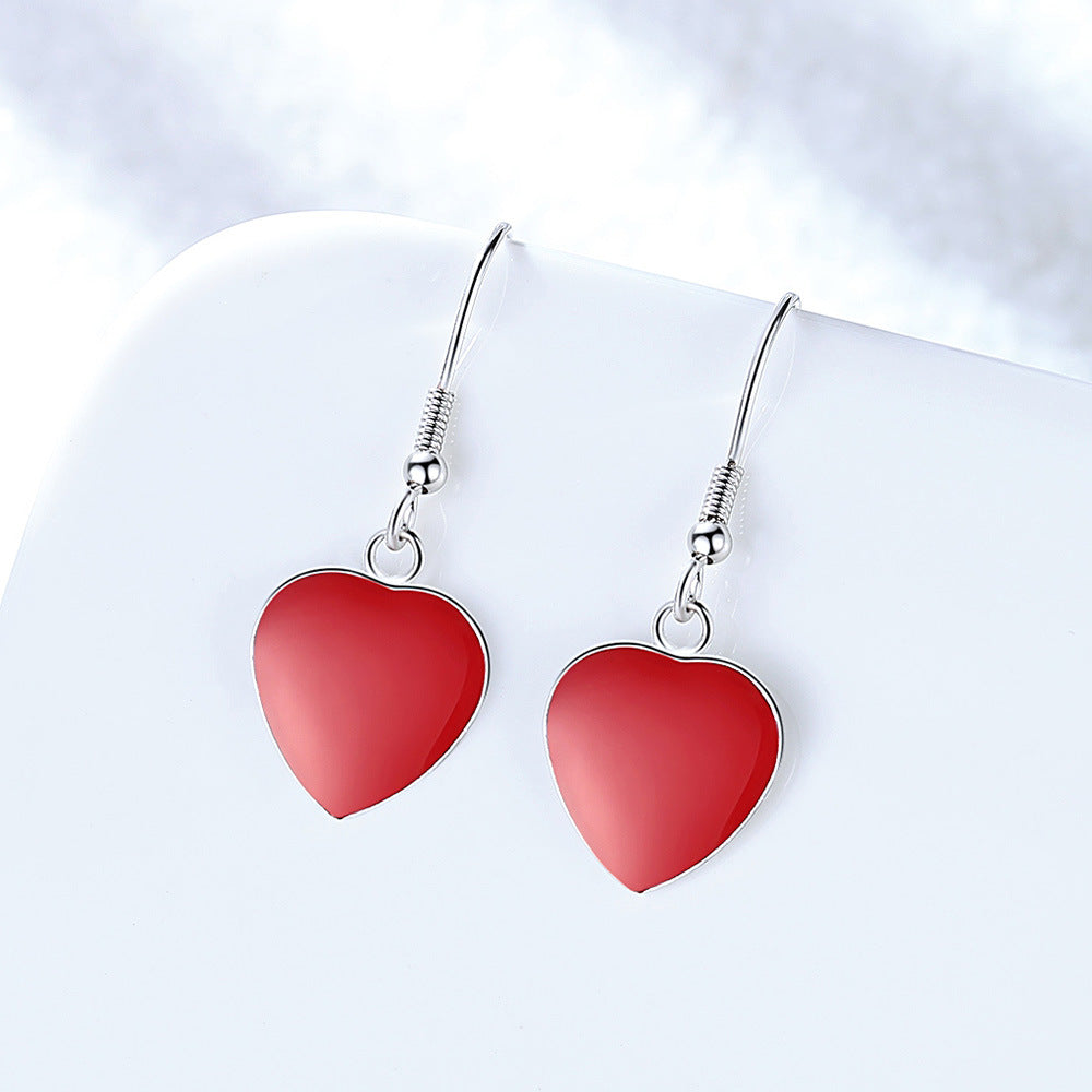 Trendy and fashionable red heart earrings