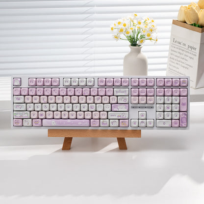Tri-mode wired, wireless, and Bluetooth silent keyboard with sleek design