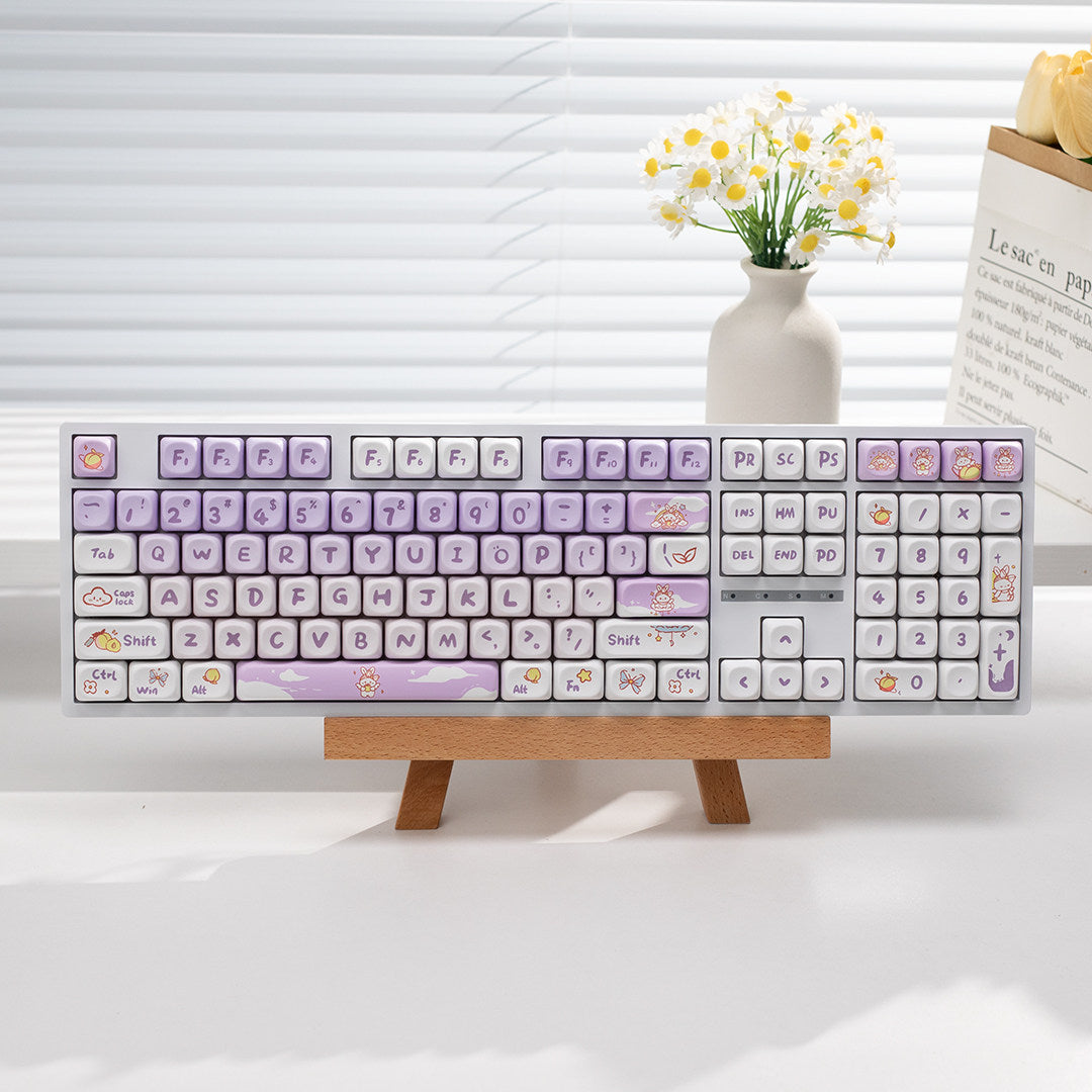 Tri-mode wired, wireless, and Bluetooth silent keyboard with sleek design