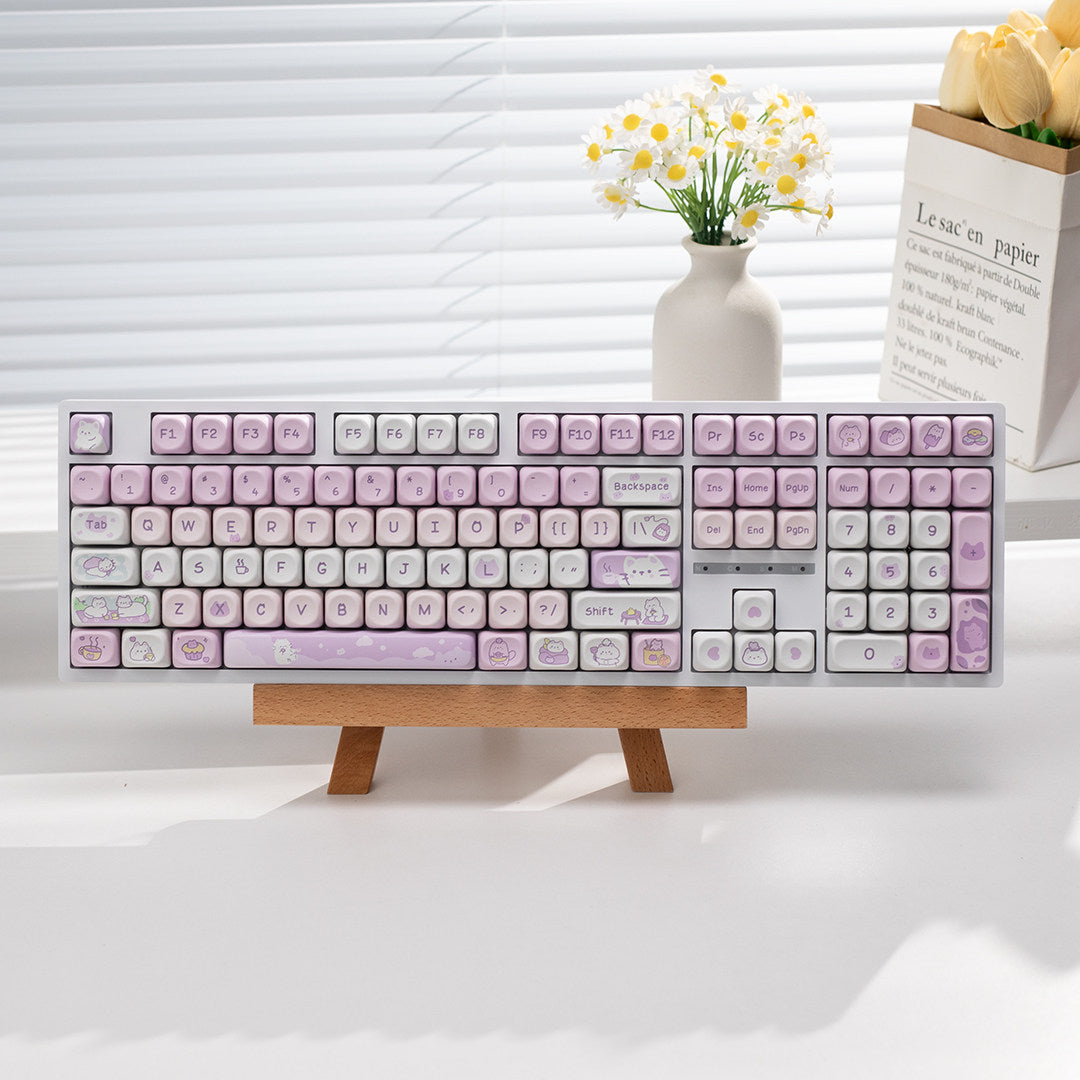 Tri-mode wired, wireless, and Bluetooth silent keyboard with sleek design