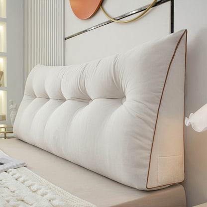 Triangular bedside cushion