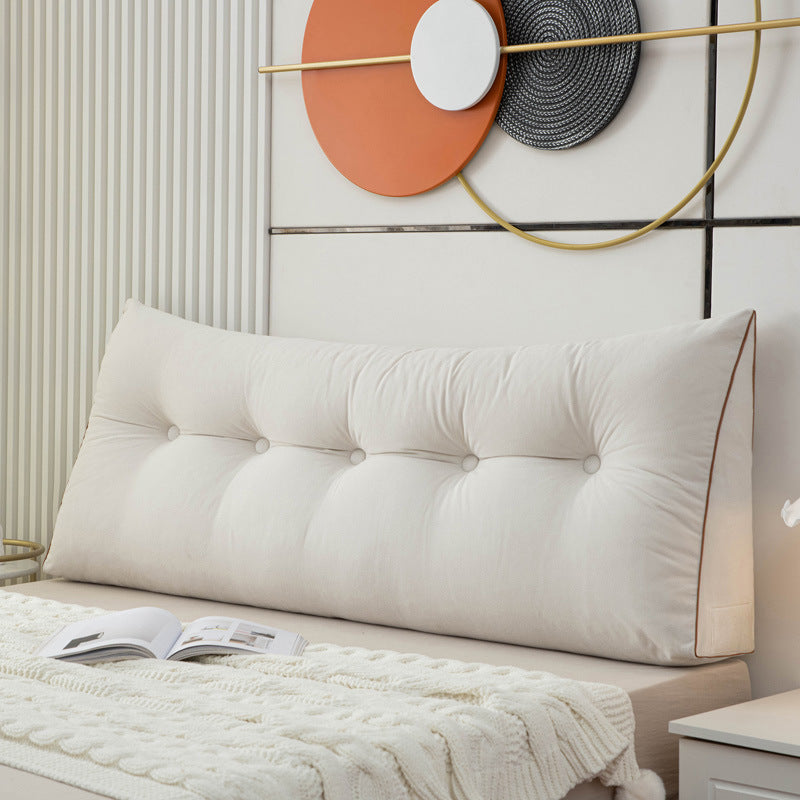 Triangular bedside cushion