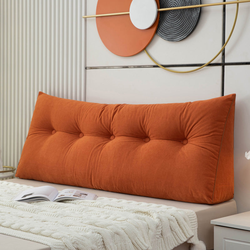 Triangular bedside cushion