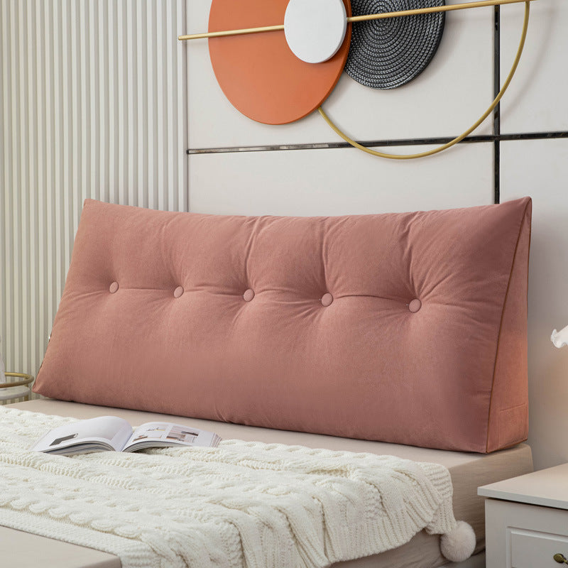 Triangular bedside cushion