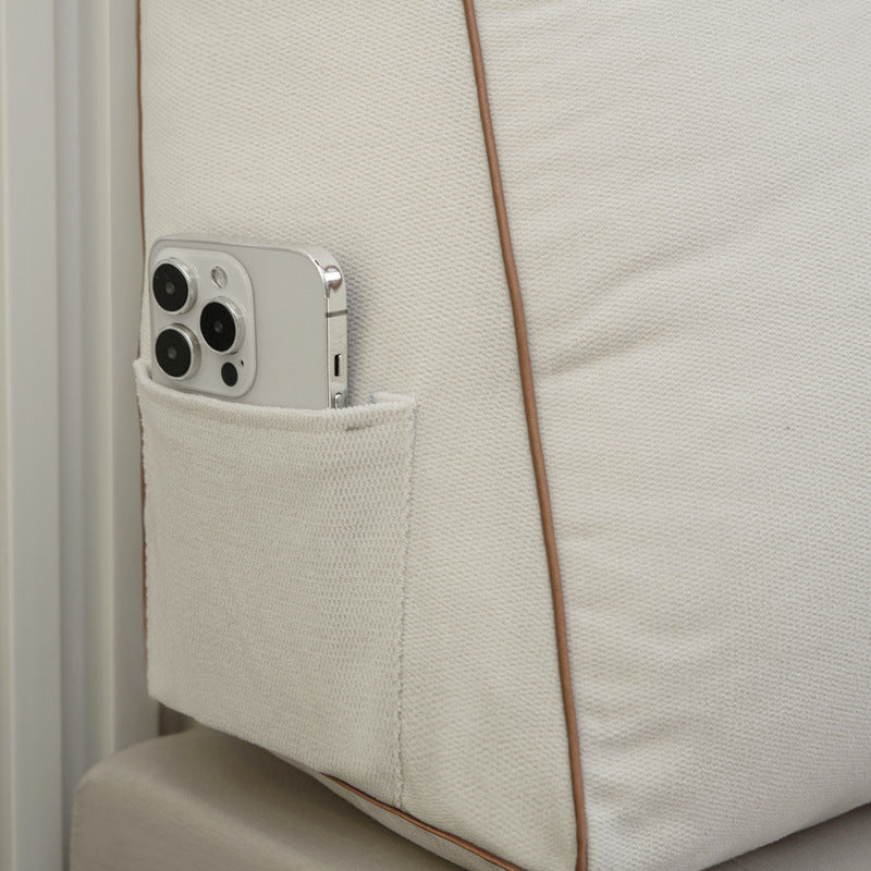 Triangular bedside cushion