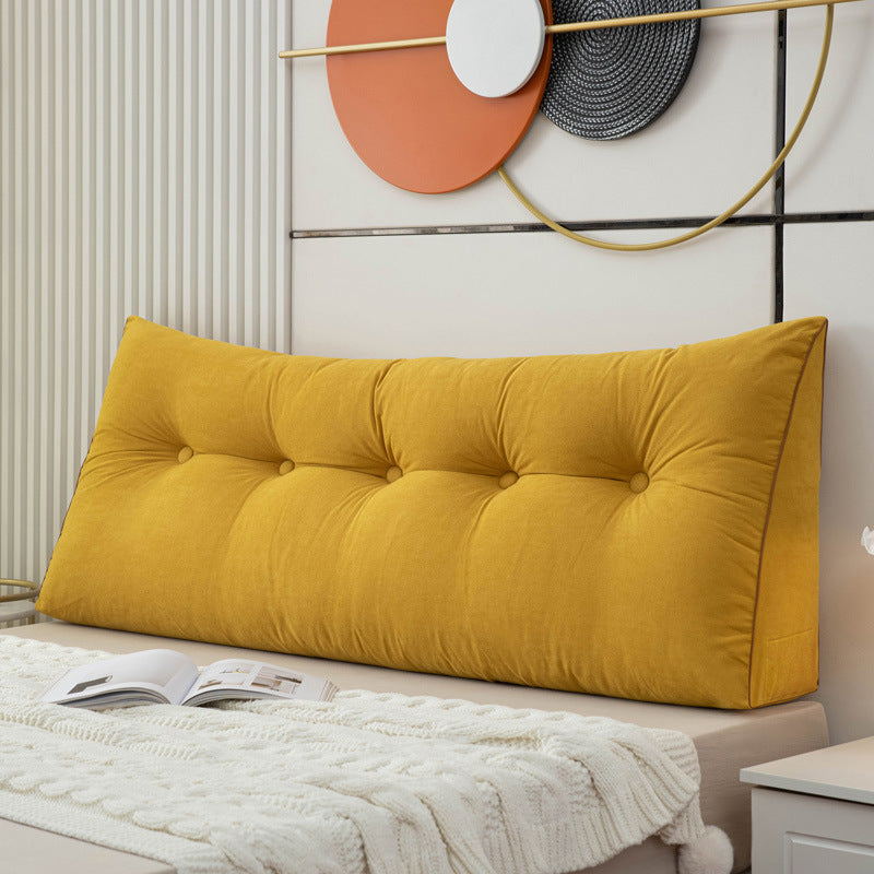 Triangular bedside cushion