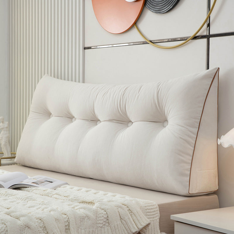 Triangular bedside cushion