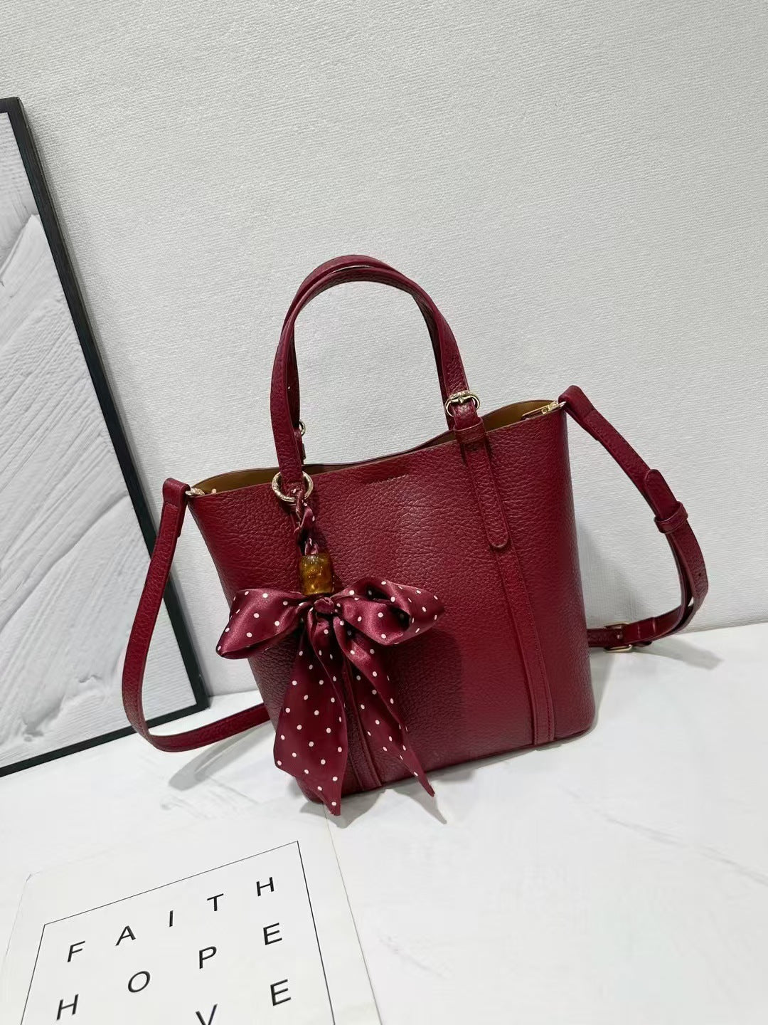 Versatile soft leather bucket bag