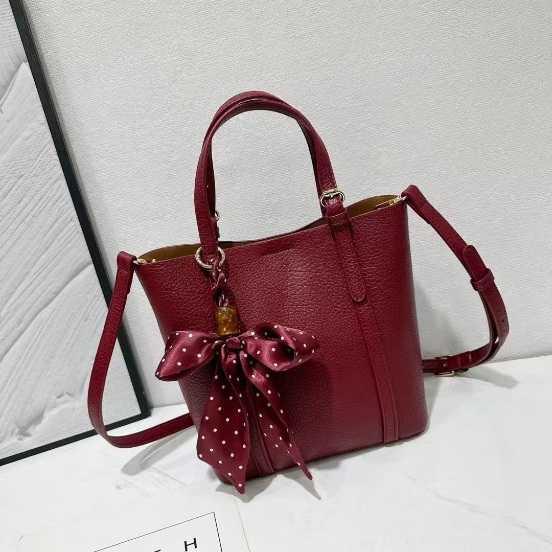 Versatile soft leather bucket bag