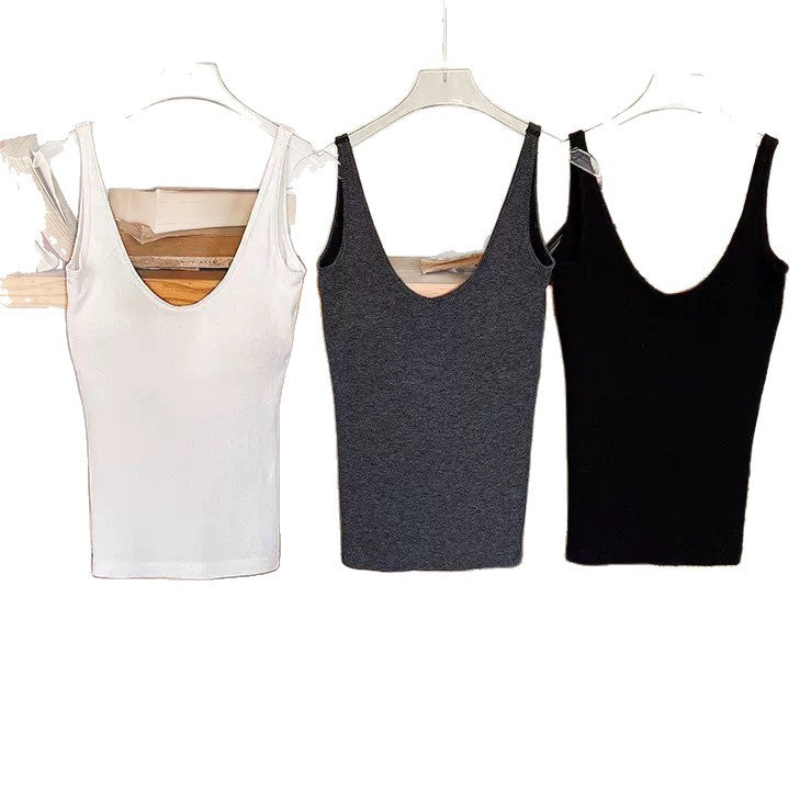 Vest with built-in breast pad