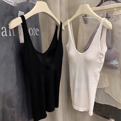 Vest with built-in breast pad