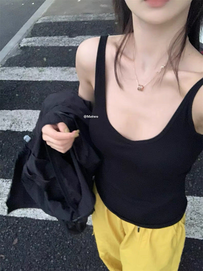 Vest with built-in breast pad