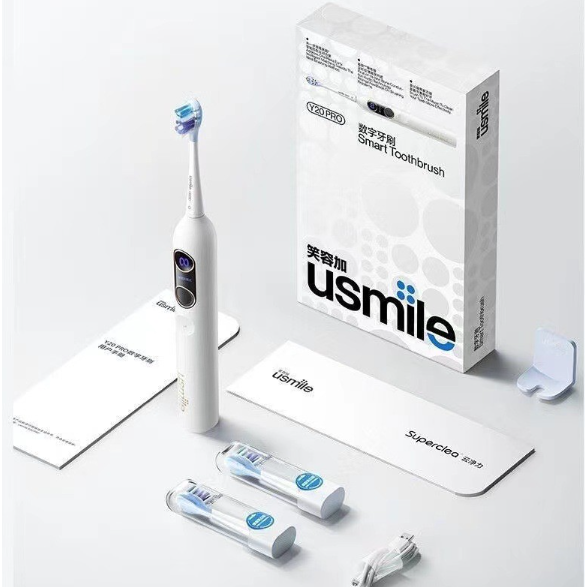Vibrating sonic toothbrush