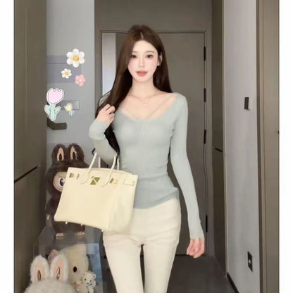 Waist-cinching elastic base knitted sweater