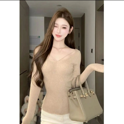 Waist-cinching elastic base knitted sweater