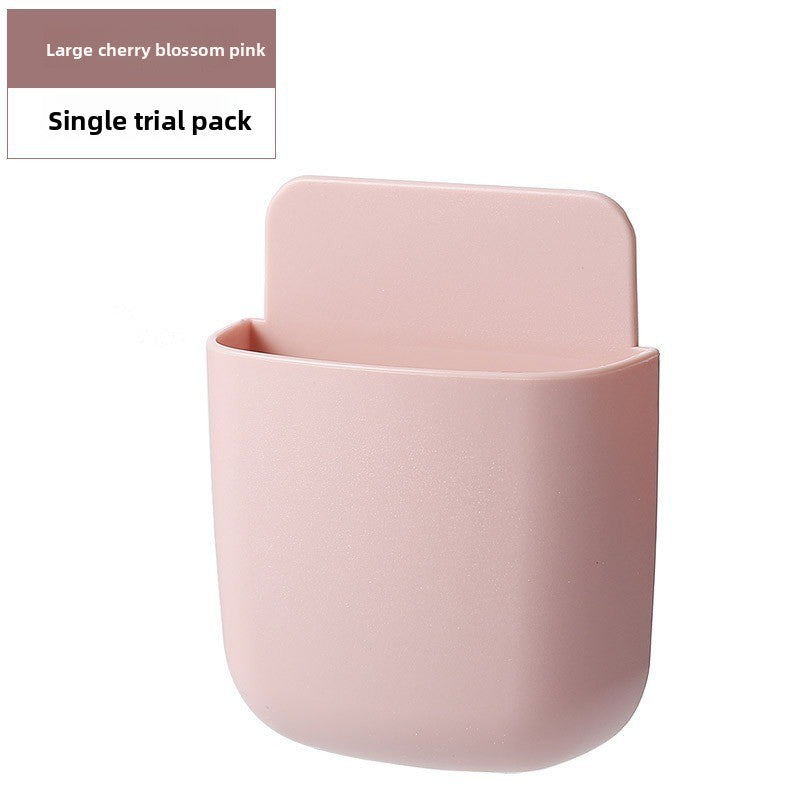 Wall-mounted bedside mobile phone charging storage rack