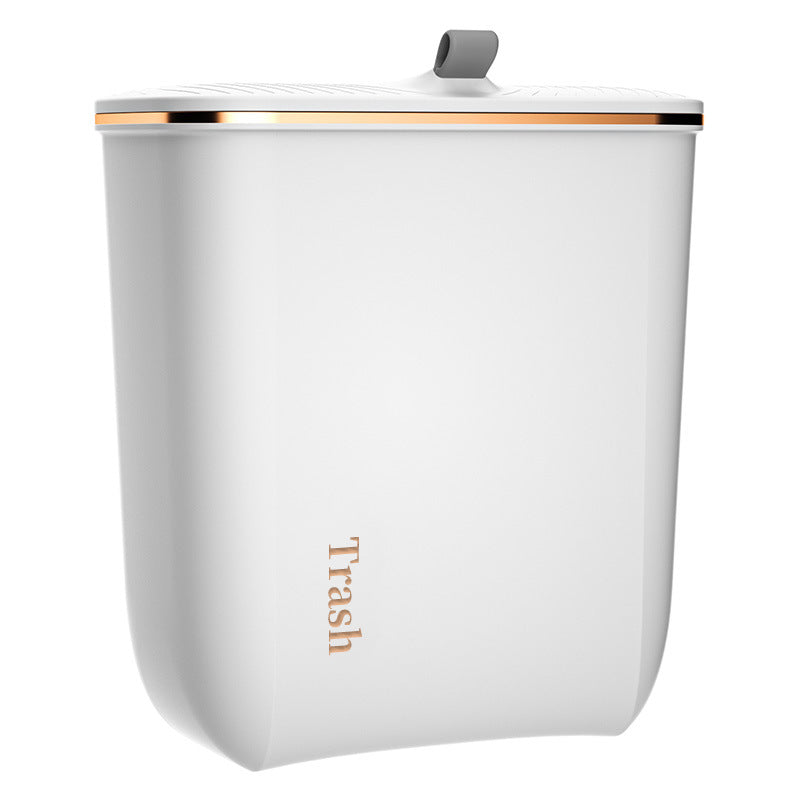 Wall-mounted trash can in the bathroom