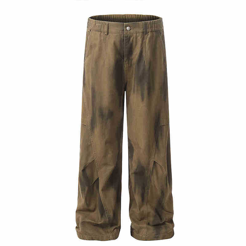 Washed and distressed curved-leg denim pants