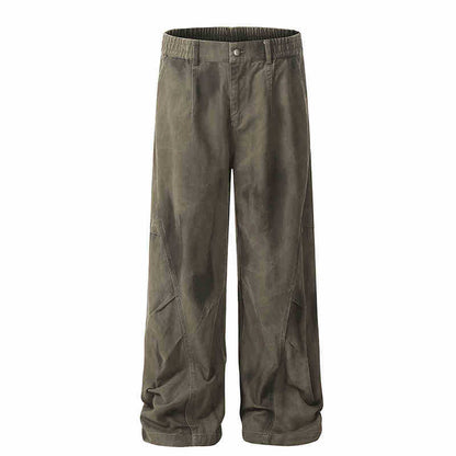 Washed and distressed curved-leg denim pants