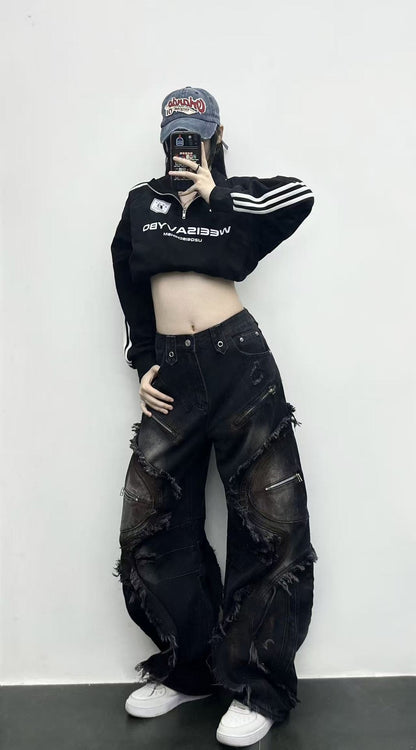 Washed curved-patterned mud-dyed jeans